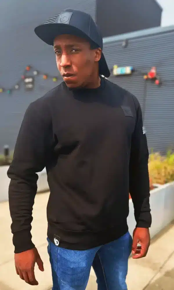 A Man wearing the AJ Stealth Sweatshirt