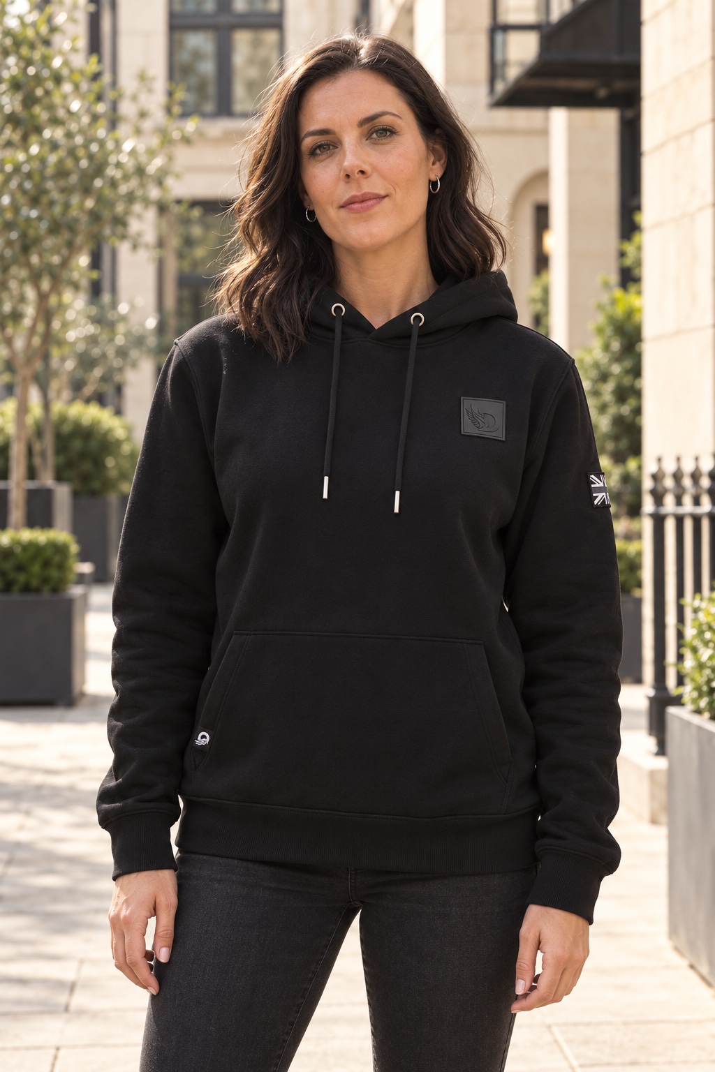 Woman wearing black DROW AJ Stealth Hoodie, front view