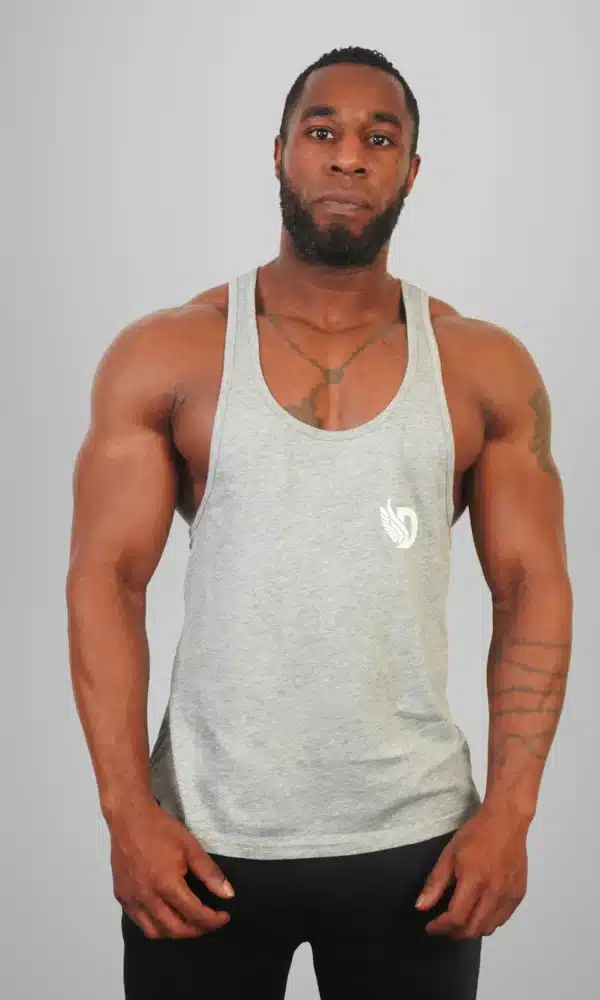 Front View of the DROW Outrider Grey Vest on a model with muscles