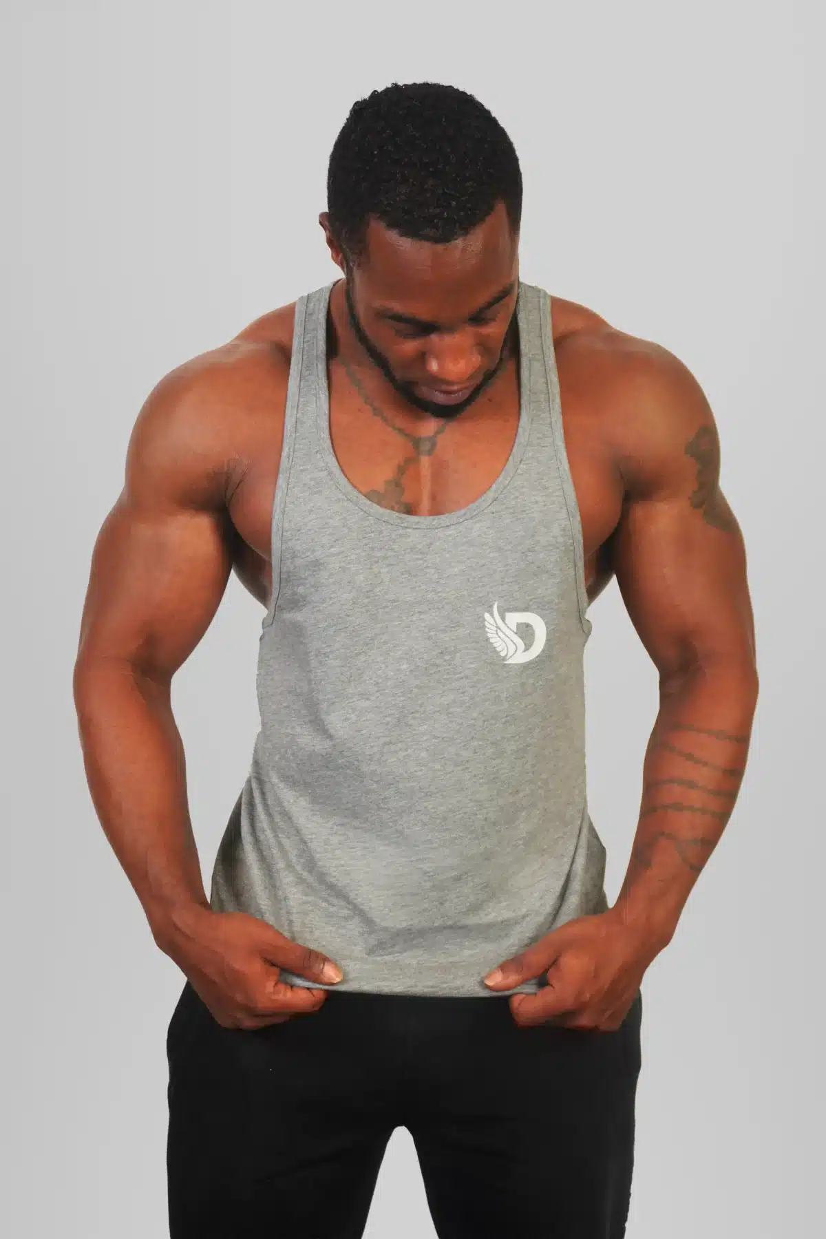 Front View of the DROW Outrider Grey Vest on a model with muscles and head down