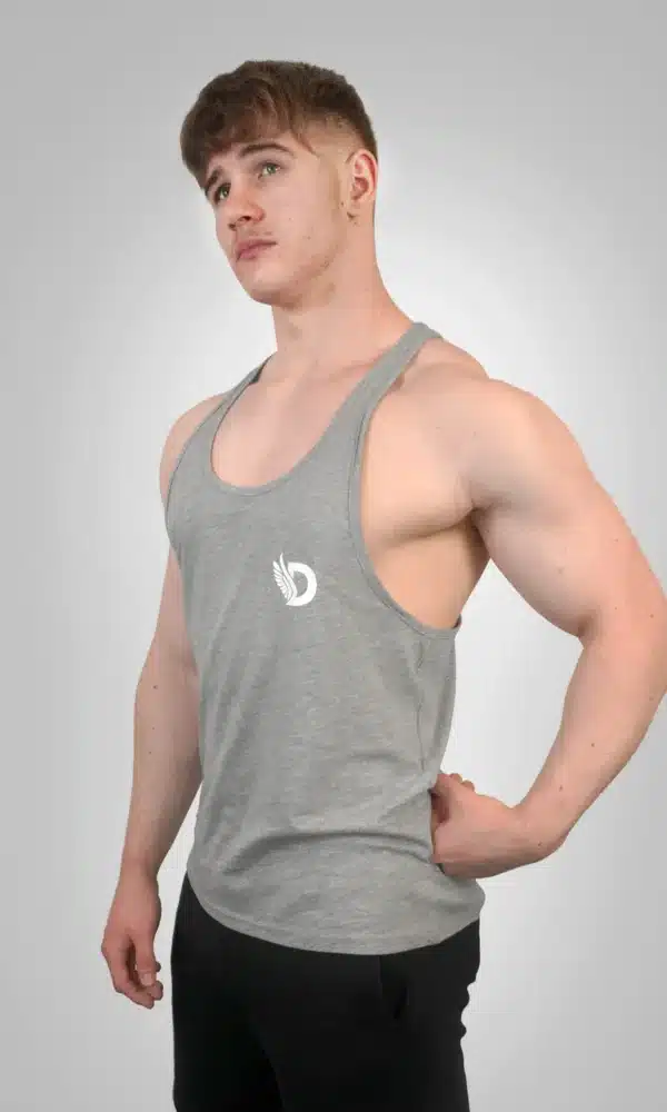 Front View of the DROW Outrider Grey Vest on a model with muscles