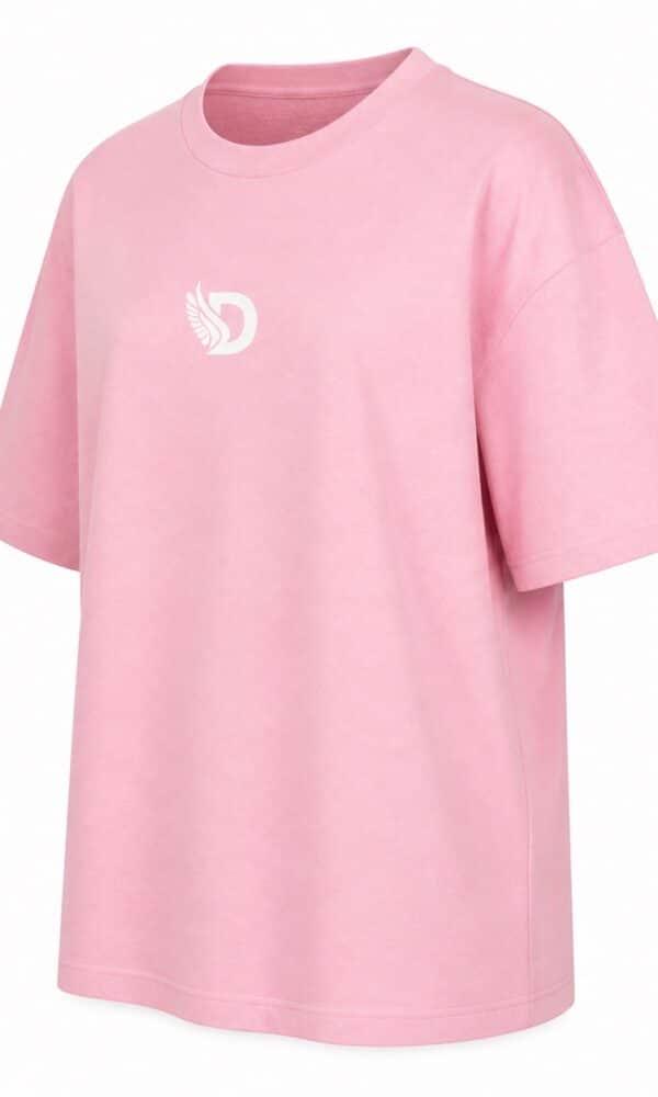 Front left view of the soft pink oversized boyfriend tee