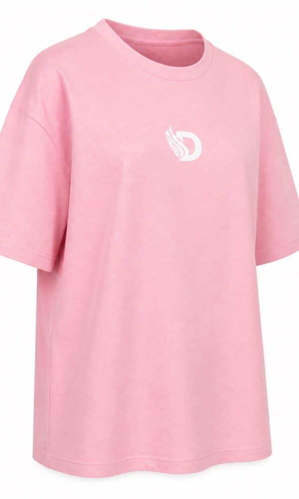 Front right view of the soft pink oversized boyfriend tee